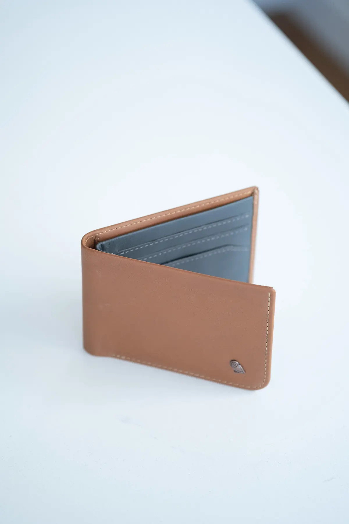 Belloy wallet open on table